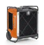 Husqvarna A 100 ilmanpuhdistin - harmaa ilmanpuhdistusyksikkö oranssilla A 100 -moottorilla ja pyörillä.